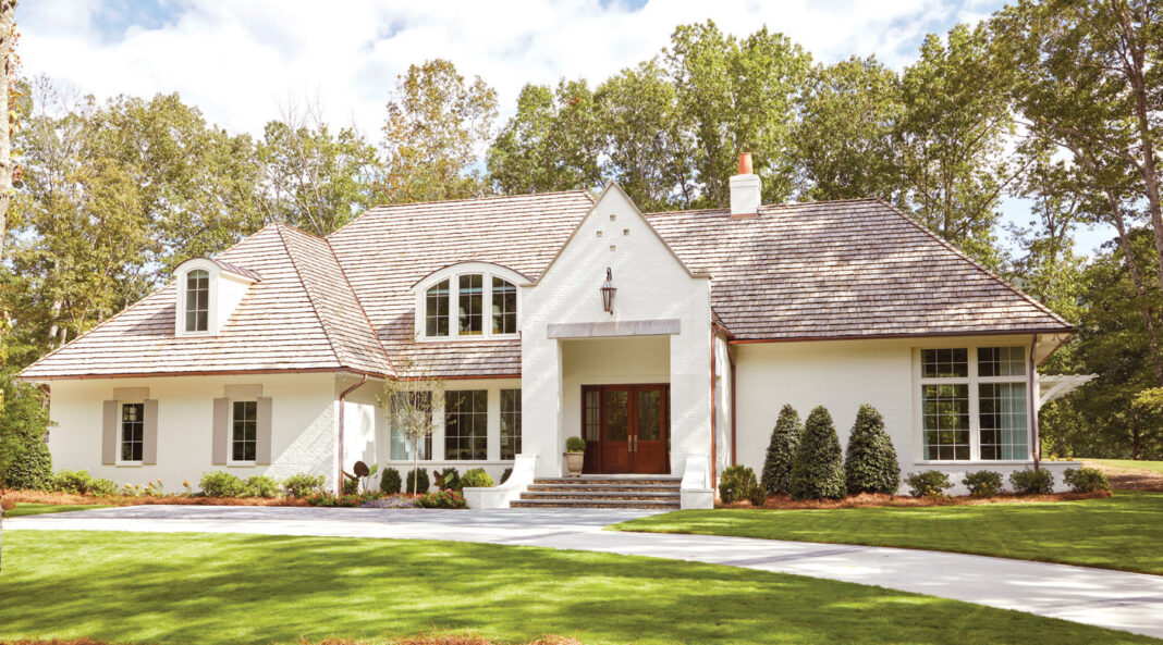 Home exterior painted in Sherwin Williams color "Alabaster"