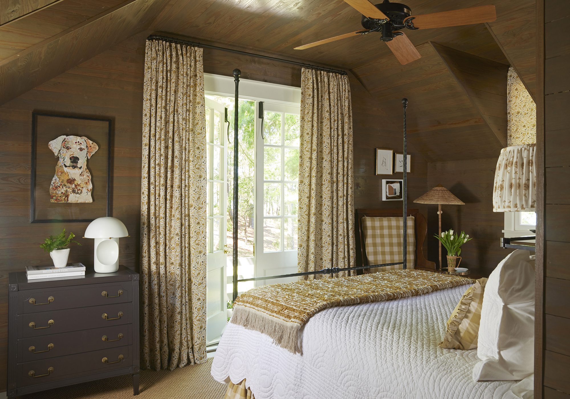 Rustic wood-paneled guest space at a Lake Martin cabin